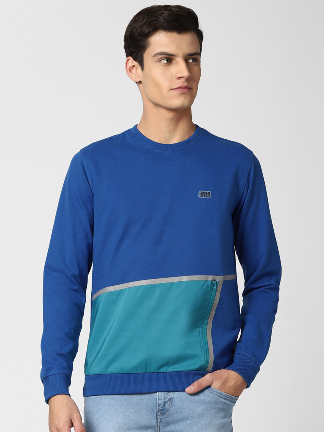 

Peter England Casuals Men Blue Colourblocked Sweatshirt
