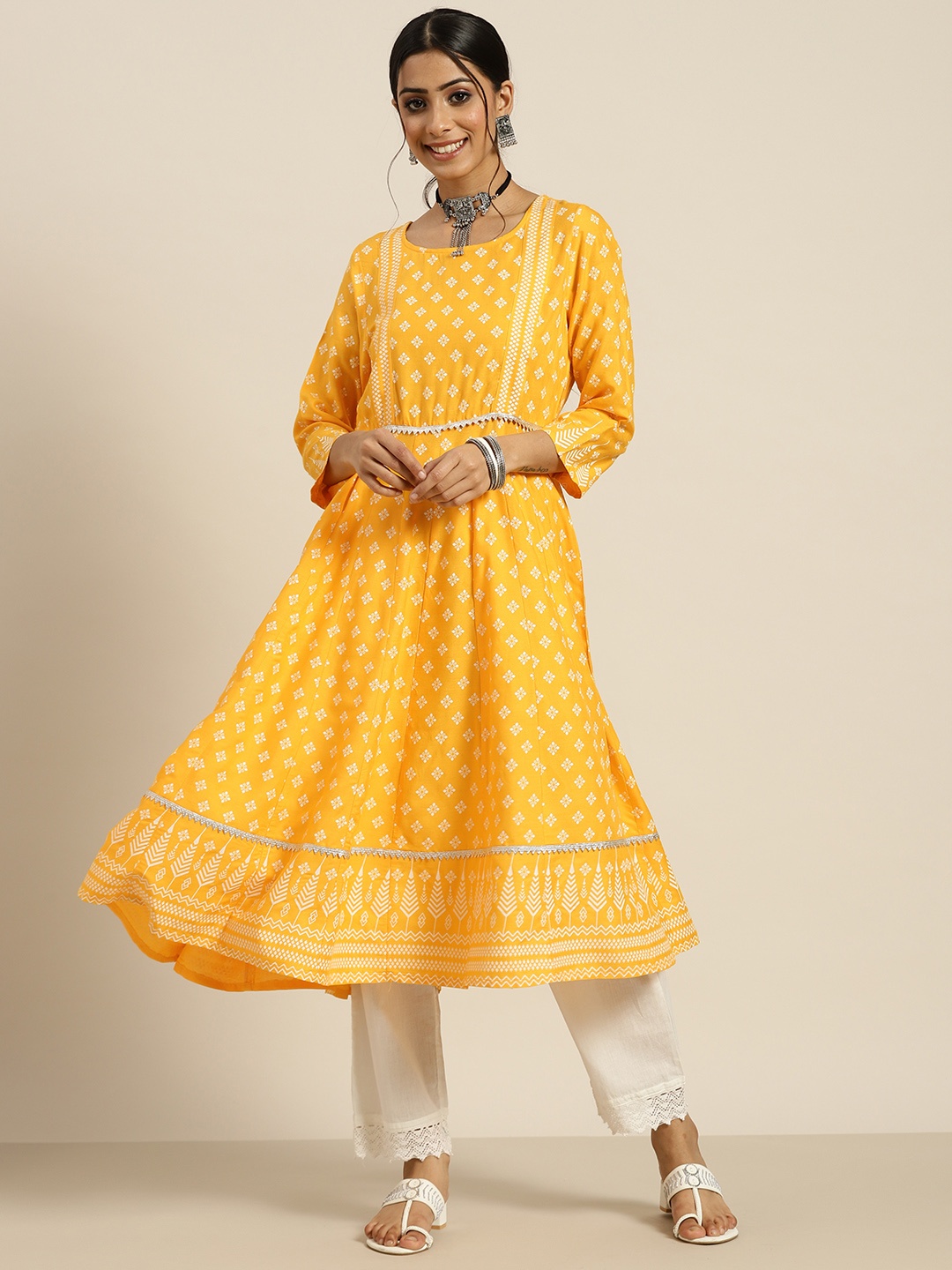 

Sangria Women Yellow & White Ethnic Motifs Print Anarkali Gotta Patti Kurta with Trousers