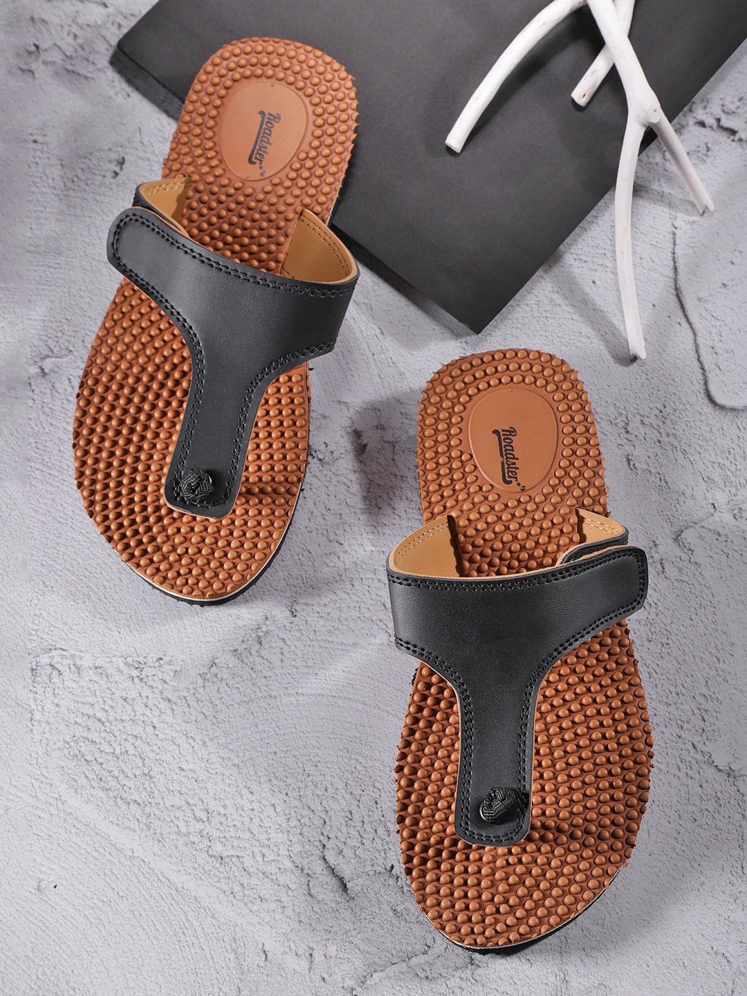 

Roadster Women Black & Brown Solid Thong Flip-Flops