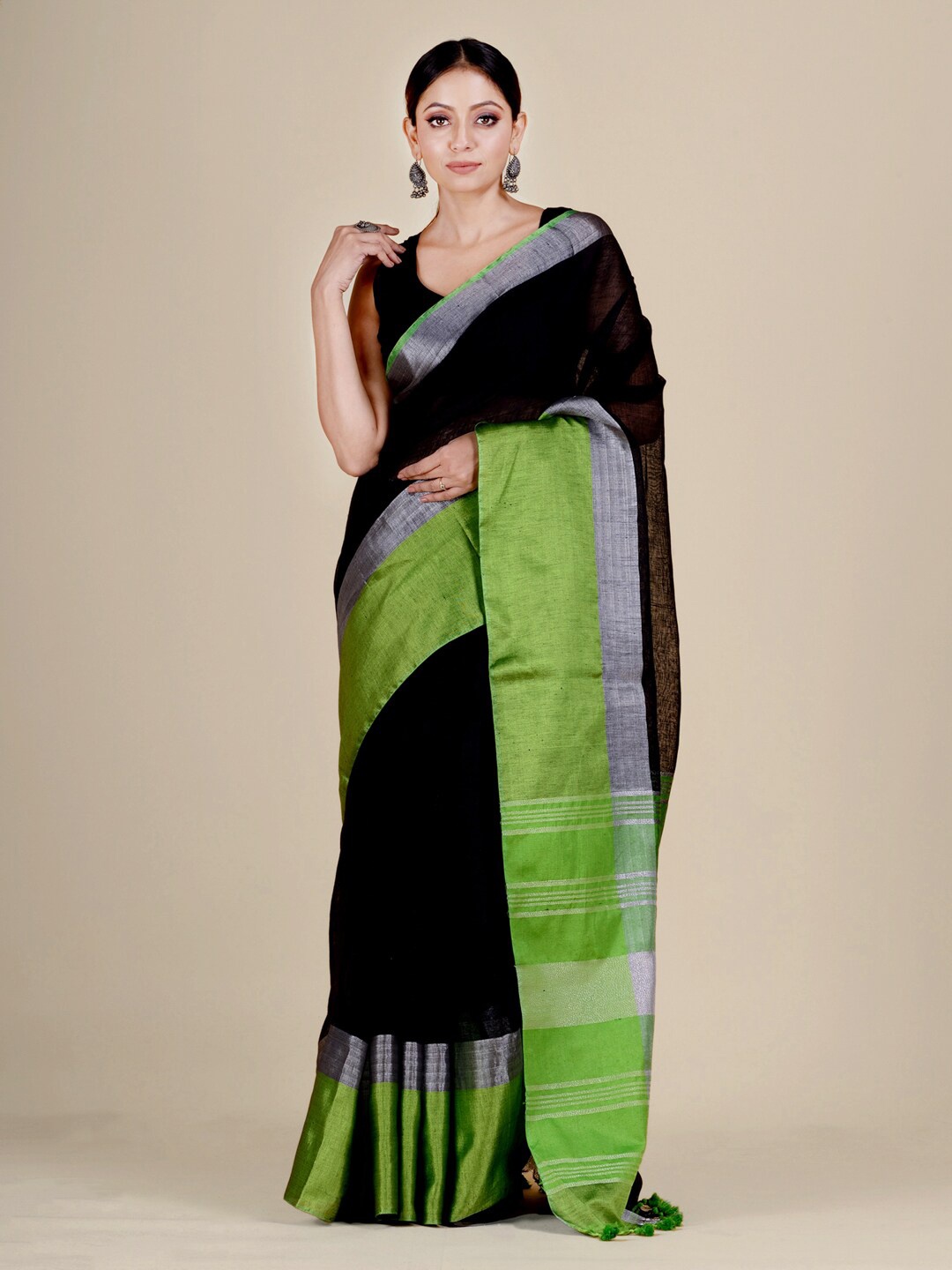 

Mitera Black & Green Woven Design Zari Pure Linen Saree