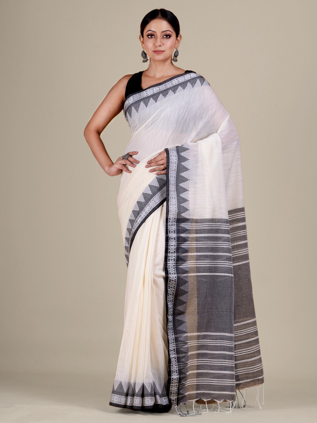 

Mitera Off White Woven Design Pure Cotton Saree