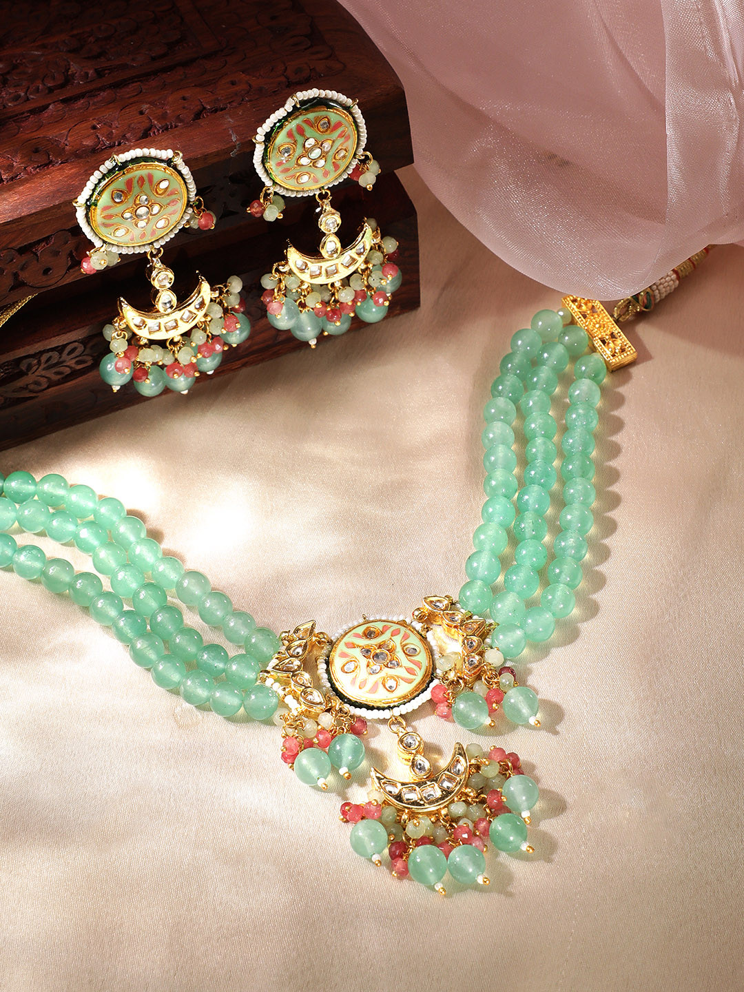 

Rubans Gold-Toned Green Stone Studded & Beaded Jewellery Set