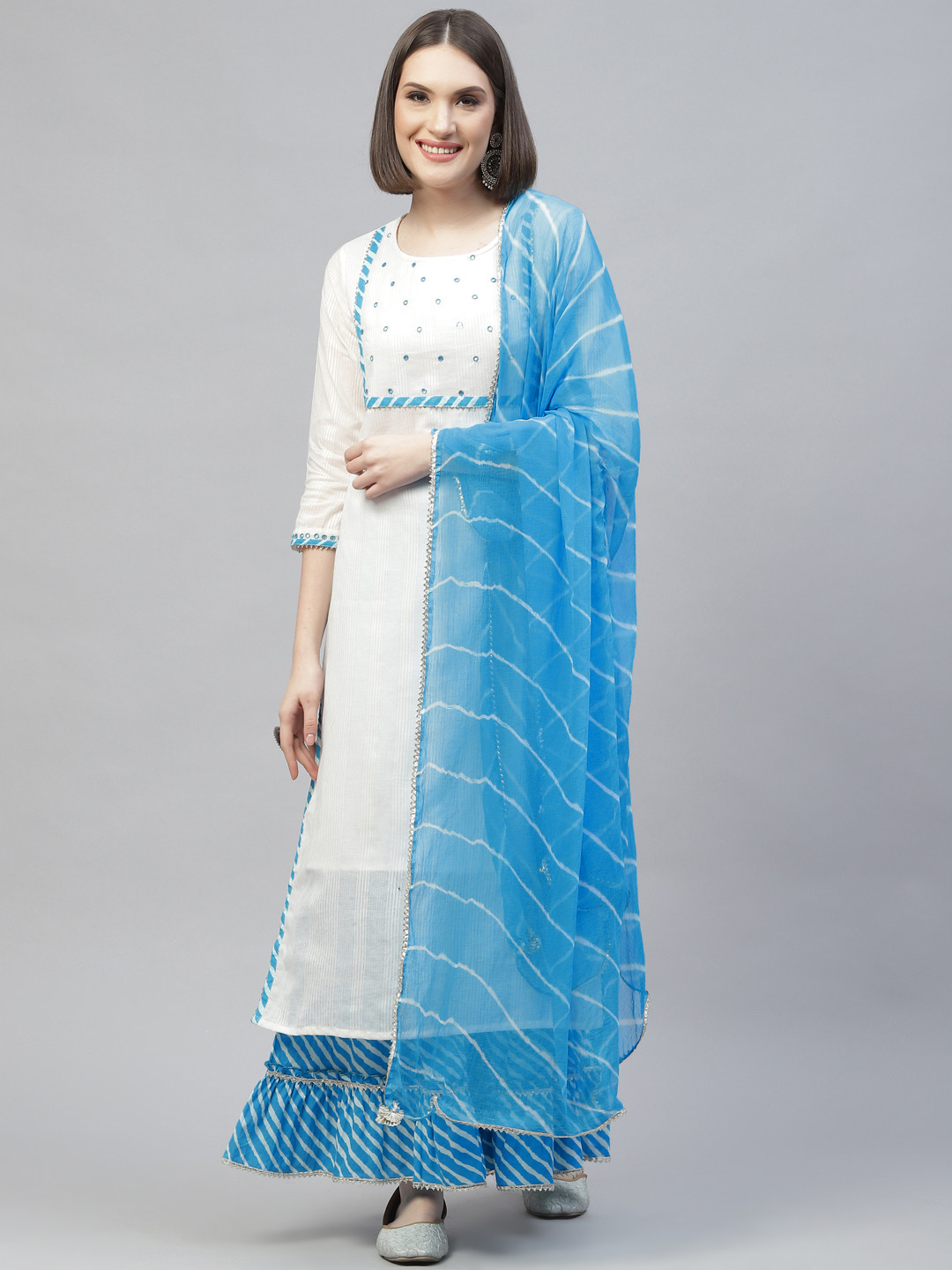

Readiprint Fashions Women White & Blue Cotton Kurta with Sharara & With Dupatta