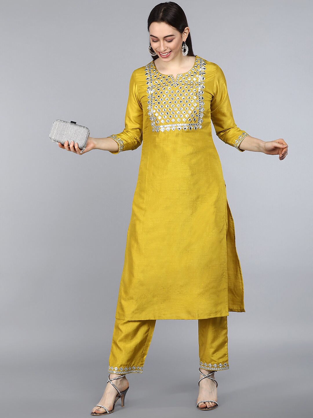 

AHIKA Women Mustard Yellow Ethnic Motifs Yoke Design Mirror Work Kurta with Trousers