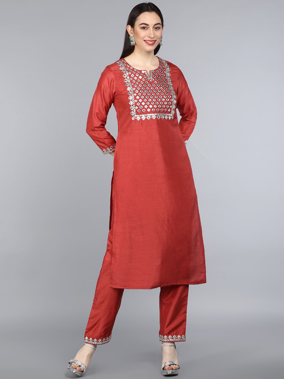 

AHIKA Women Red & Silver-Coloured Yoke Design Mirror Work Kurta with Trousers