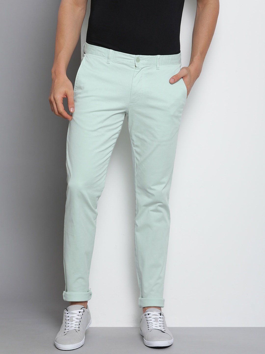 

Tommy Hilfiger Men Solid Slim Fit Regular Trousers, Green