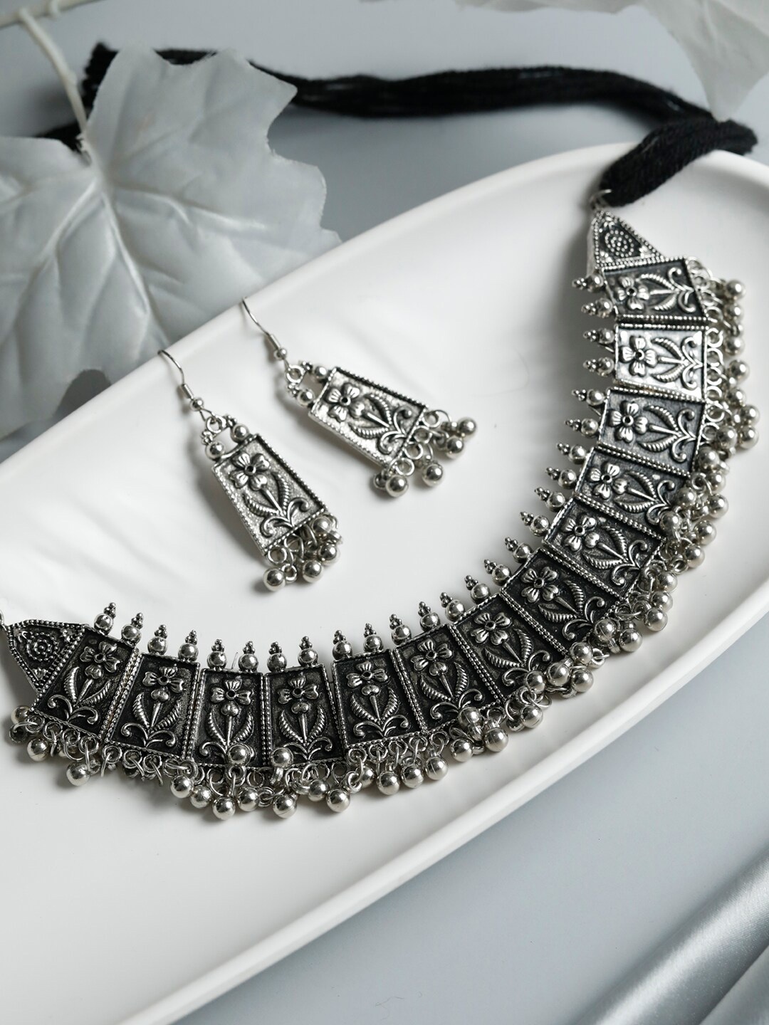 

Priyaasi Silver-Plated Tribal Oxidised Floral Jewellery Set