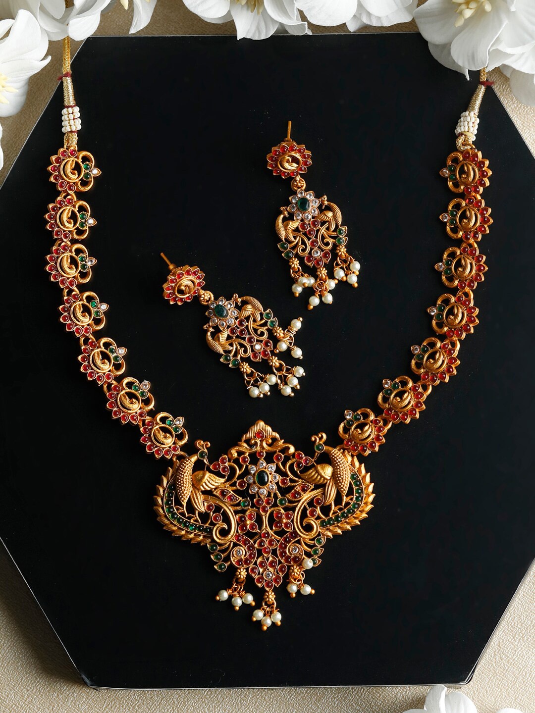 

Priyaasi Gold-Plated Red & Green Stone Studded & Beaded Peacock Jewellery Set