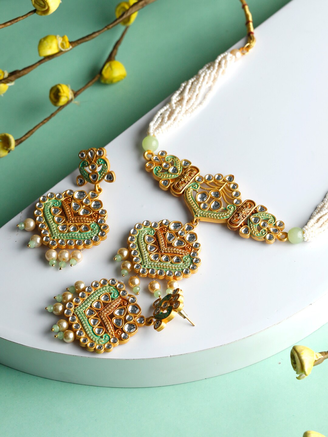 

Priyaasi Gold-Plated Green Stone Studded & Beaded Meenakari Jewellery Set