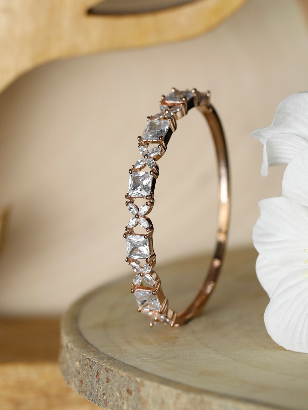 

Priyaasi Women White American Diamond Studded Rose Gold-Plated Bangle-Style Bracelet