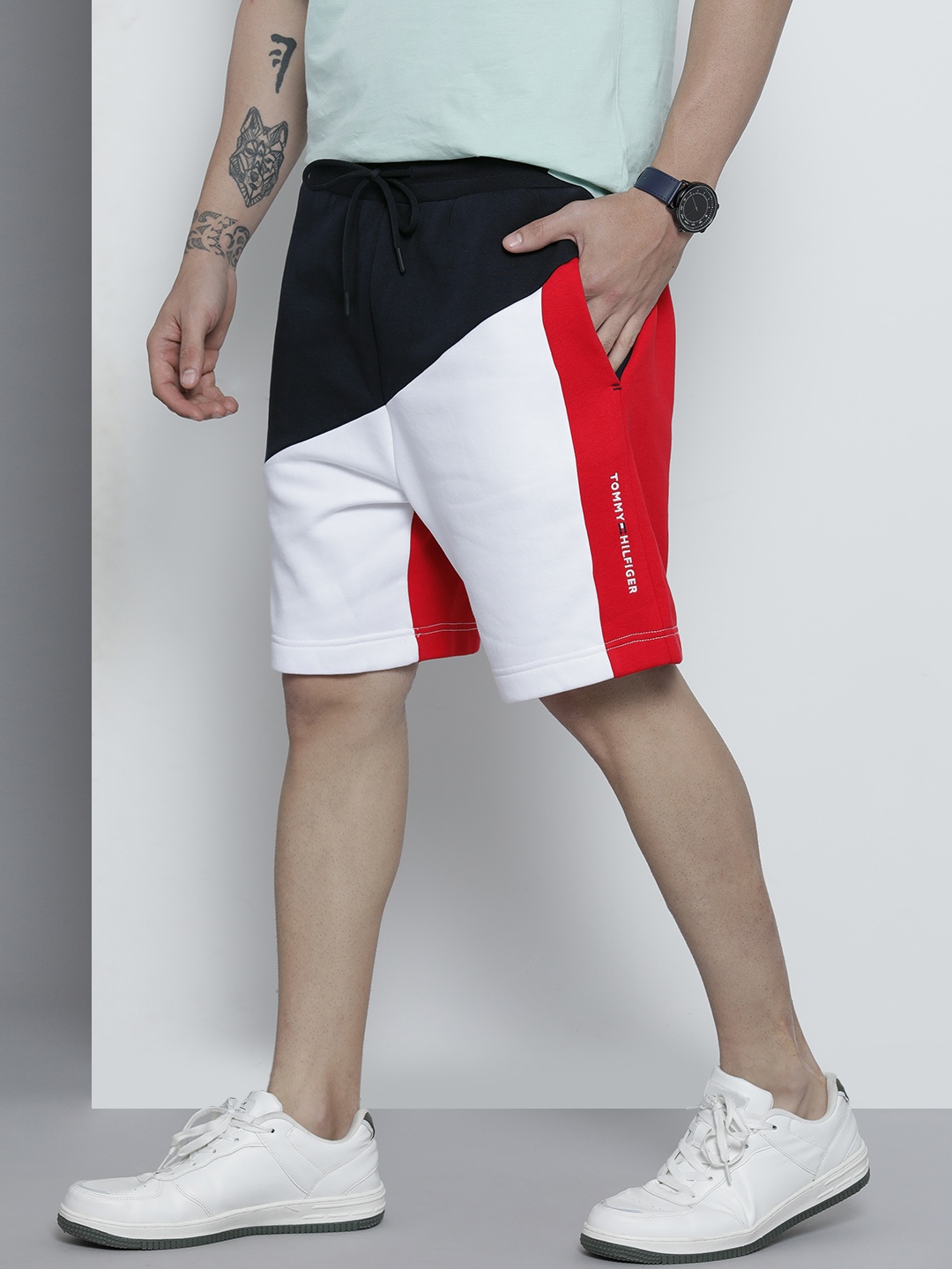 

Tommy Hilfiger Men Navy Blue & White Colourblocked Shorts
