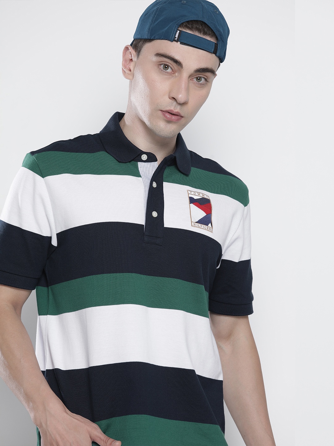 

Tommy Hilfiger Men Navy Blue & Teal Green Striped Polo Collar Pure Cotton T-shirt