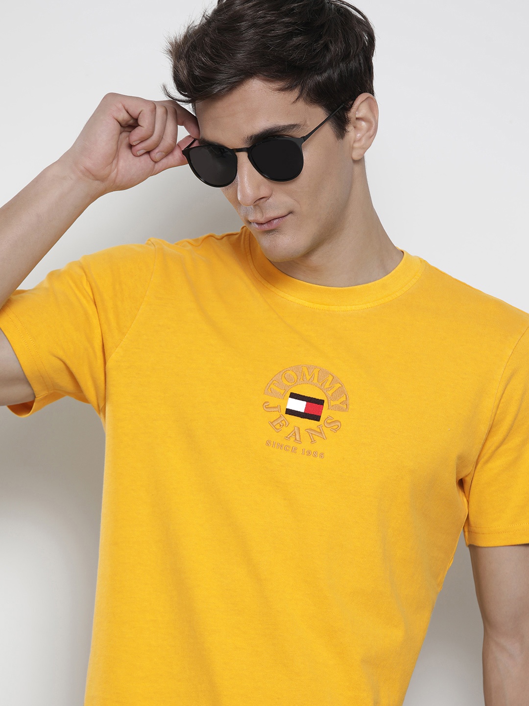 

Tommy Hilfiger Men Yellow Brand Logo Embroidered Round Neck Pure Cotton T-shirt