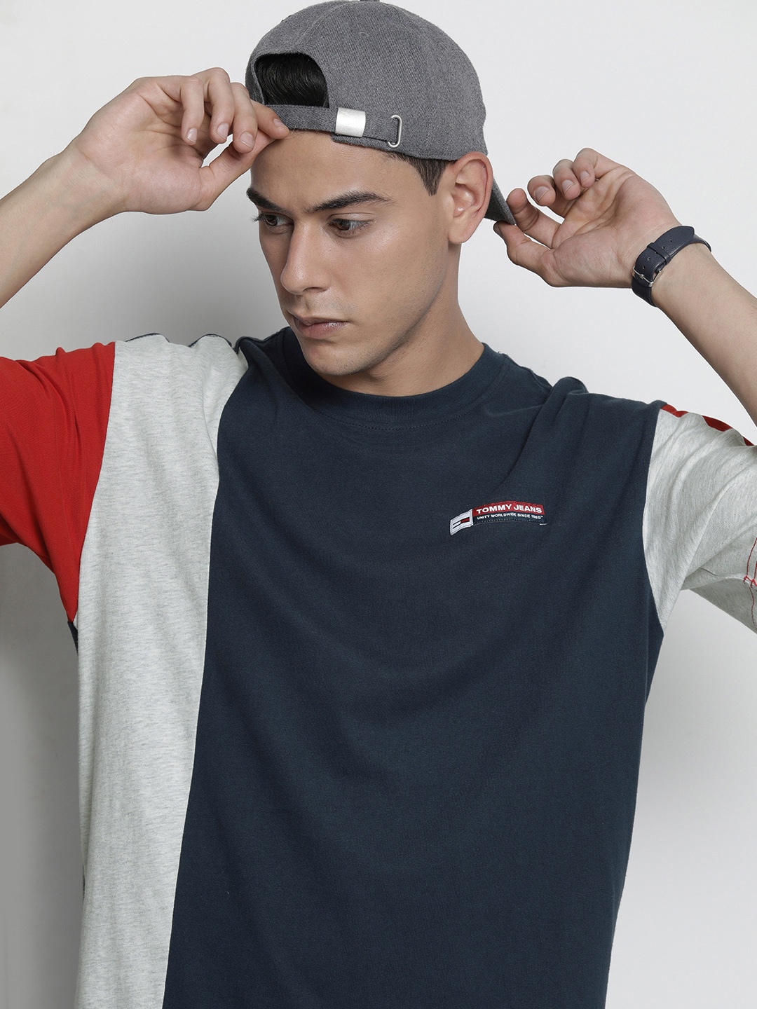

Tommy Hilfiger Men Navy Blue & Grey Colourblocked Pure Cotton T-shirt