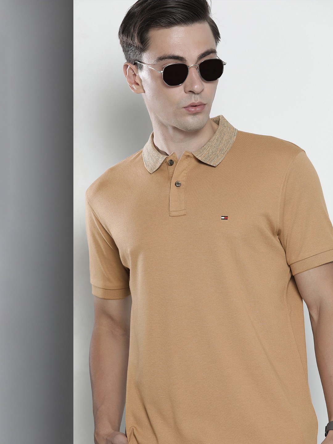 

Tommy Hilfiger Men Light Brown Solid Polo Collar Casual T-shirt