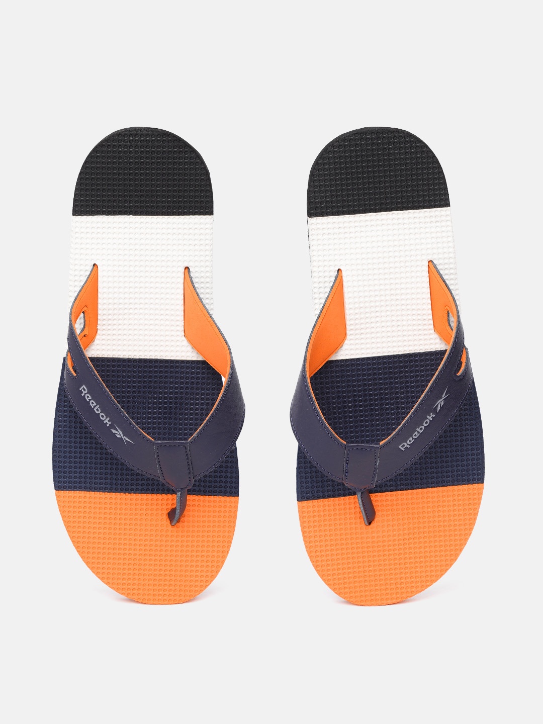 

Reebok Men Navy Blue & Orange Colourblocked Thong Flip-Flops