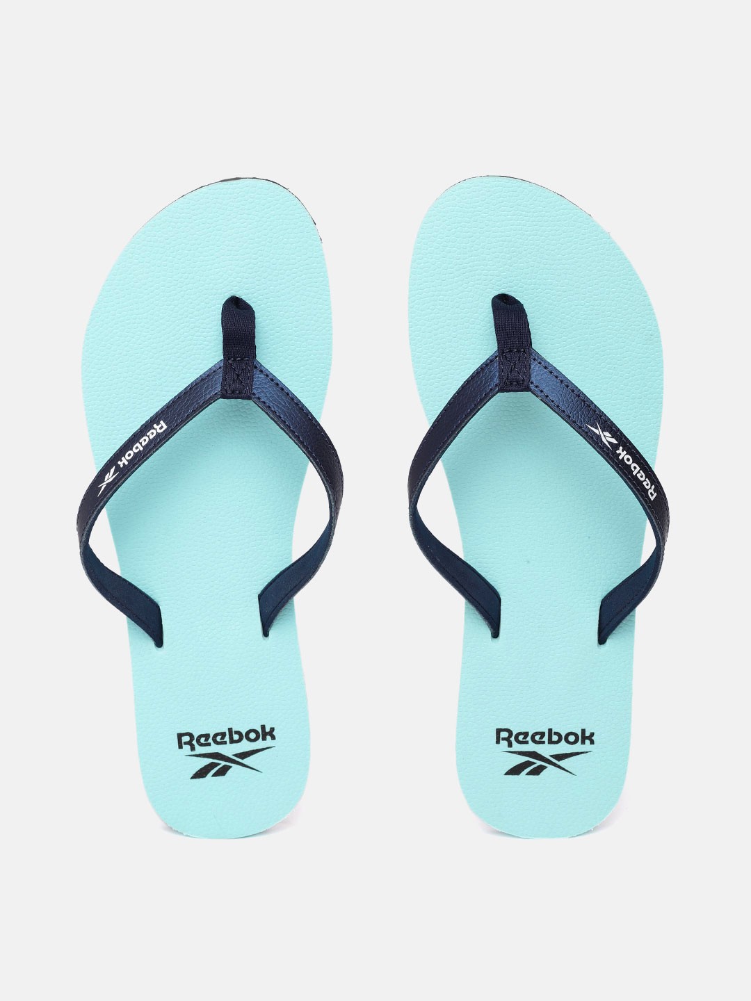 

Reebok Women Blue Solid Thong Flip-Flops