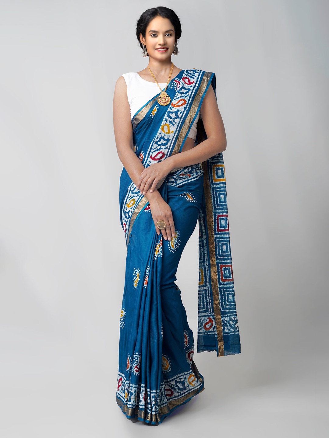 

Unnati Silks Teal & White Batik Zari Pure Cotton Handloom Sustainable Block Print Saree