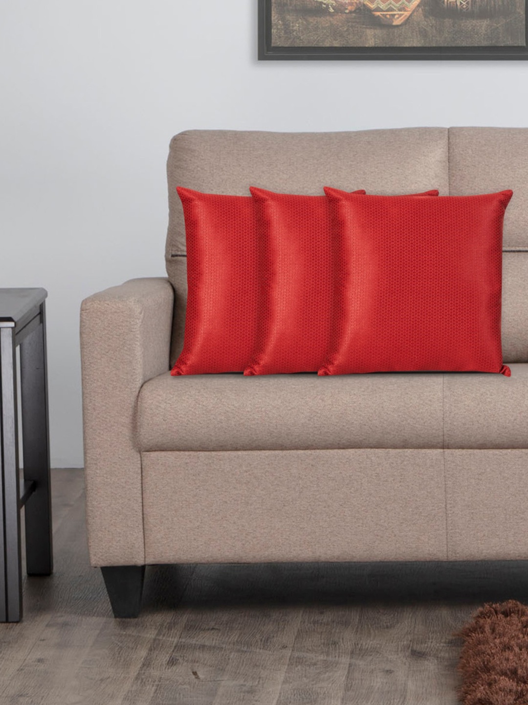 

Home Centre Set Of 3 Red Textured Filled Cushions