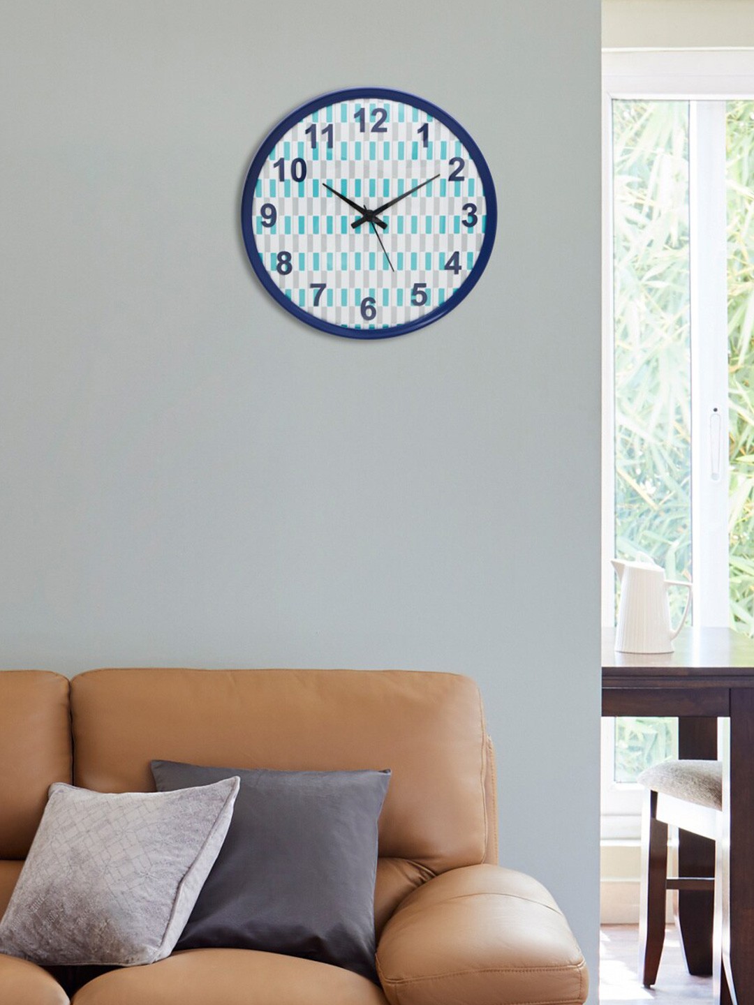 

Home Centre Teal & White Colour-blocked Analogue Wall Clock