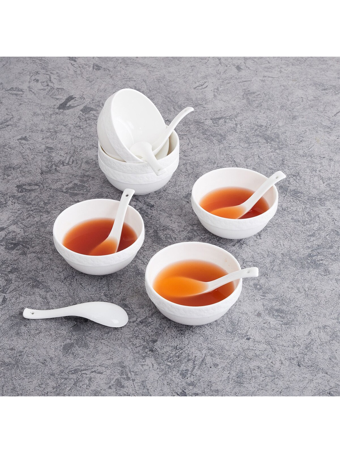 

Home Centre Set Of 12 White Solid Bone China Matte Finish Bowls