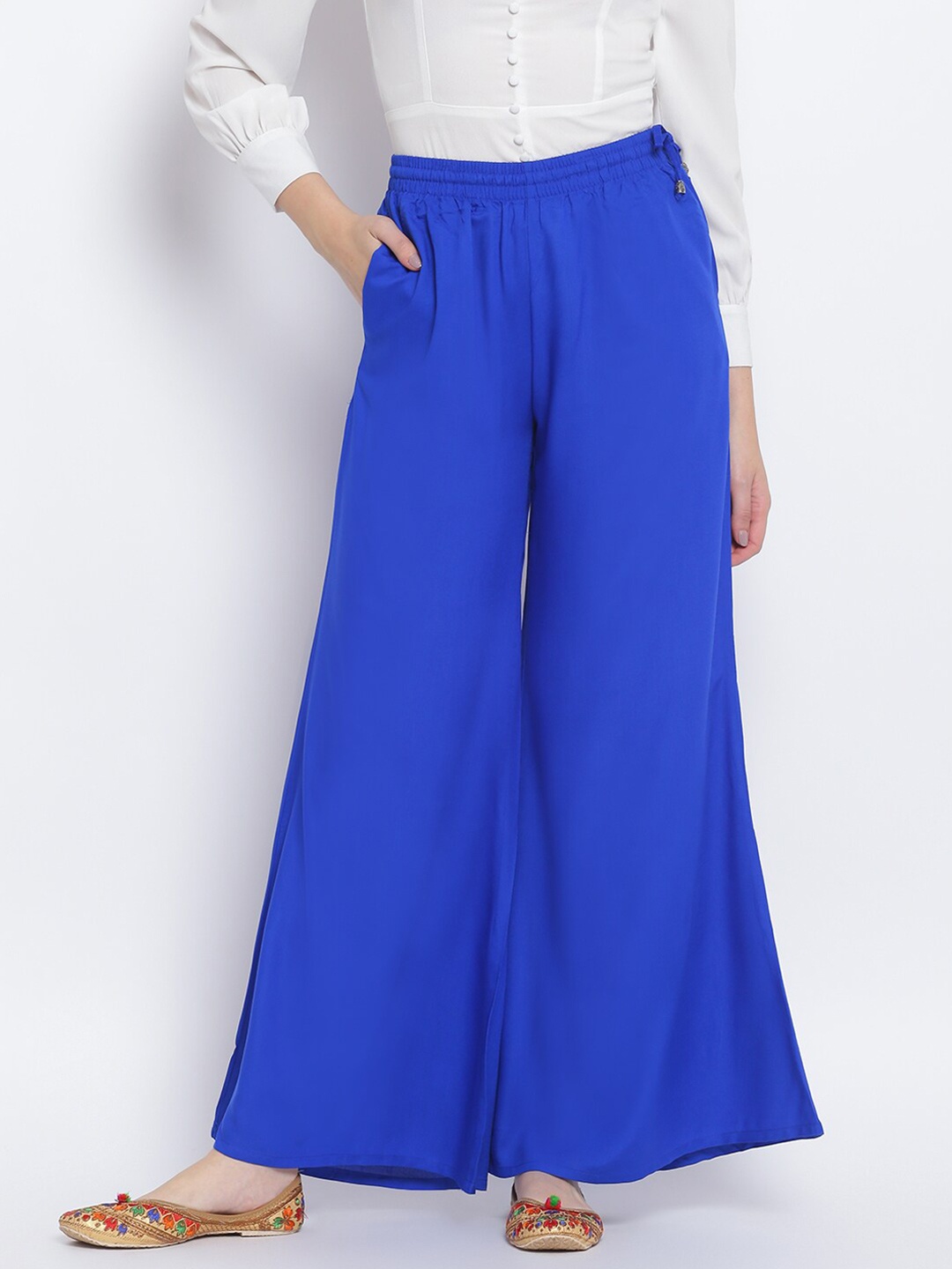 

Lakshita Women Royal Blue Solid Flared Chambray Palazzos