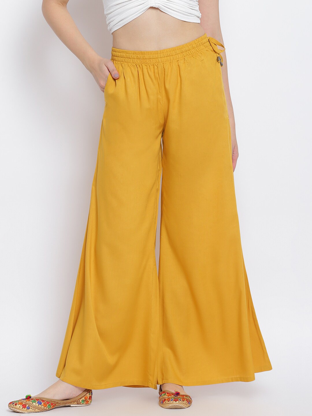 

Lakshita Women Yellow Solid Wide Leg Fit Palazzo