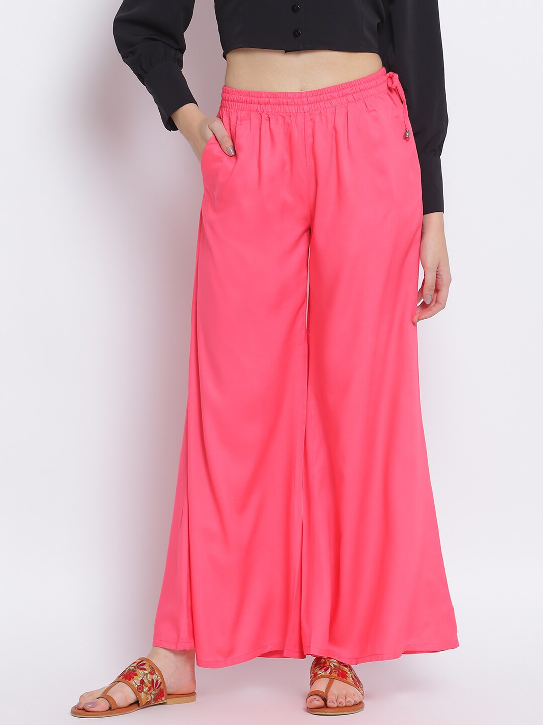 

Lakshita Women Pink Solid Flared Palazzos