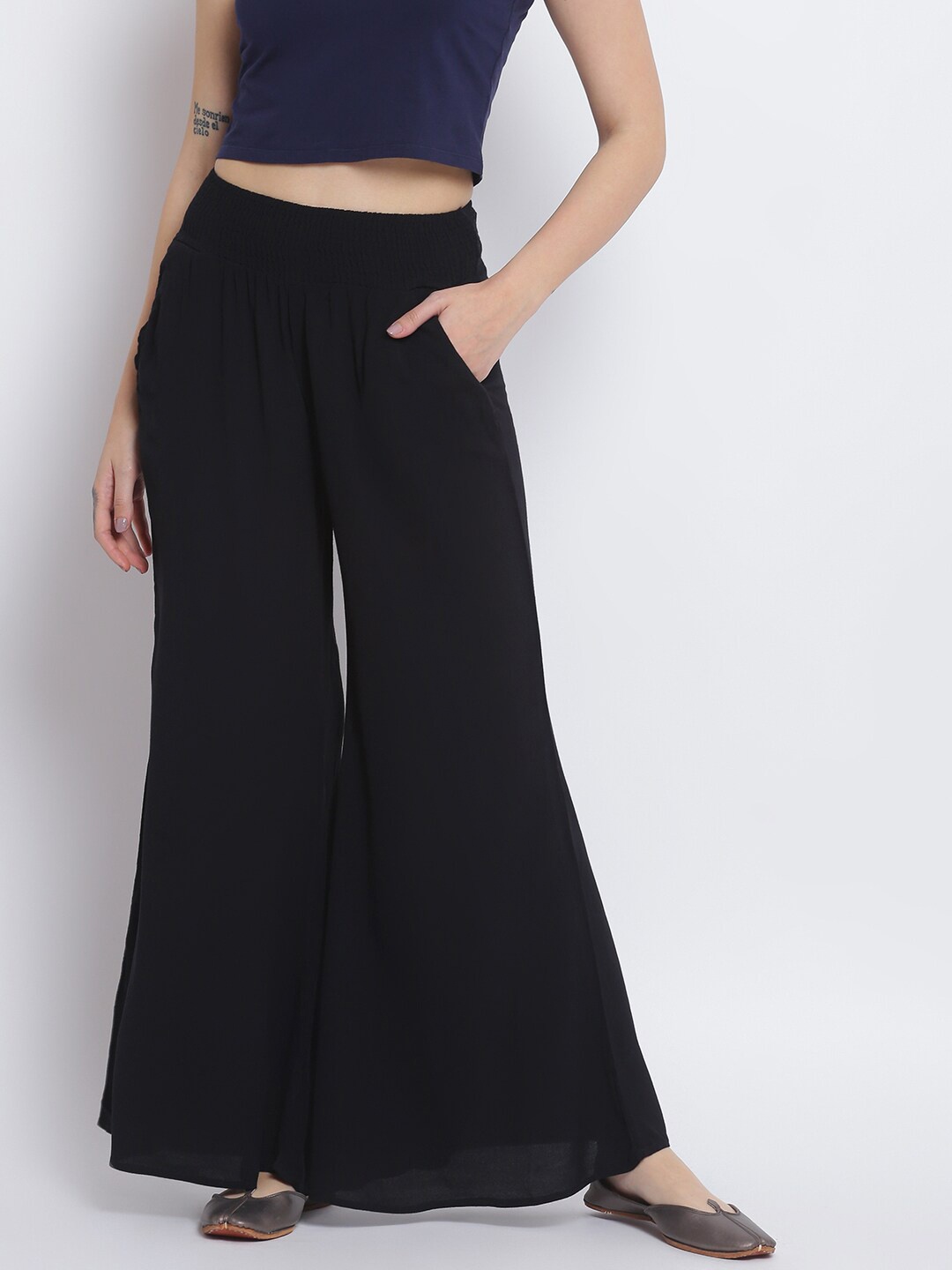 

Lakshita Women Black Solid Wide Leg Fit Palazzo