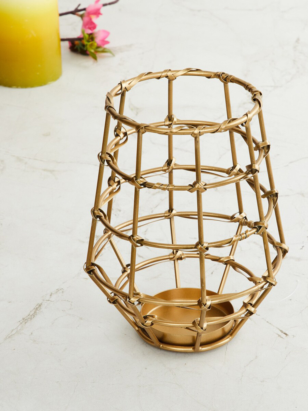 

Home Centre Gold Toned Metal T-Light Holder