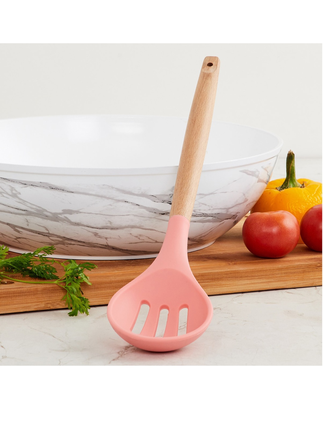 

Home Centre Pink Solid Silicone Slotted Spoon With Wooden Handle