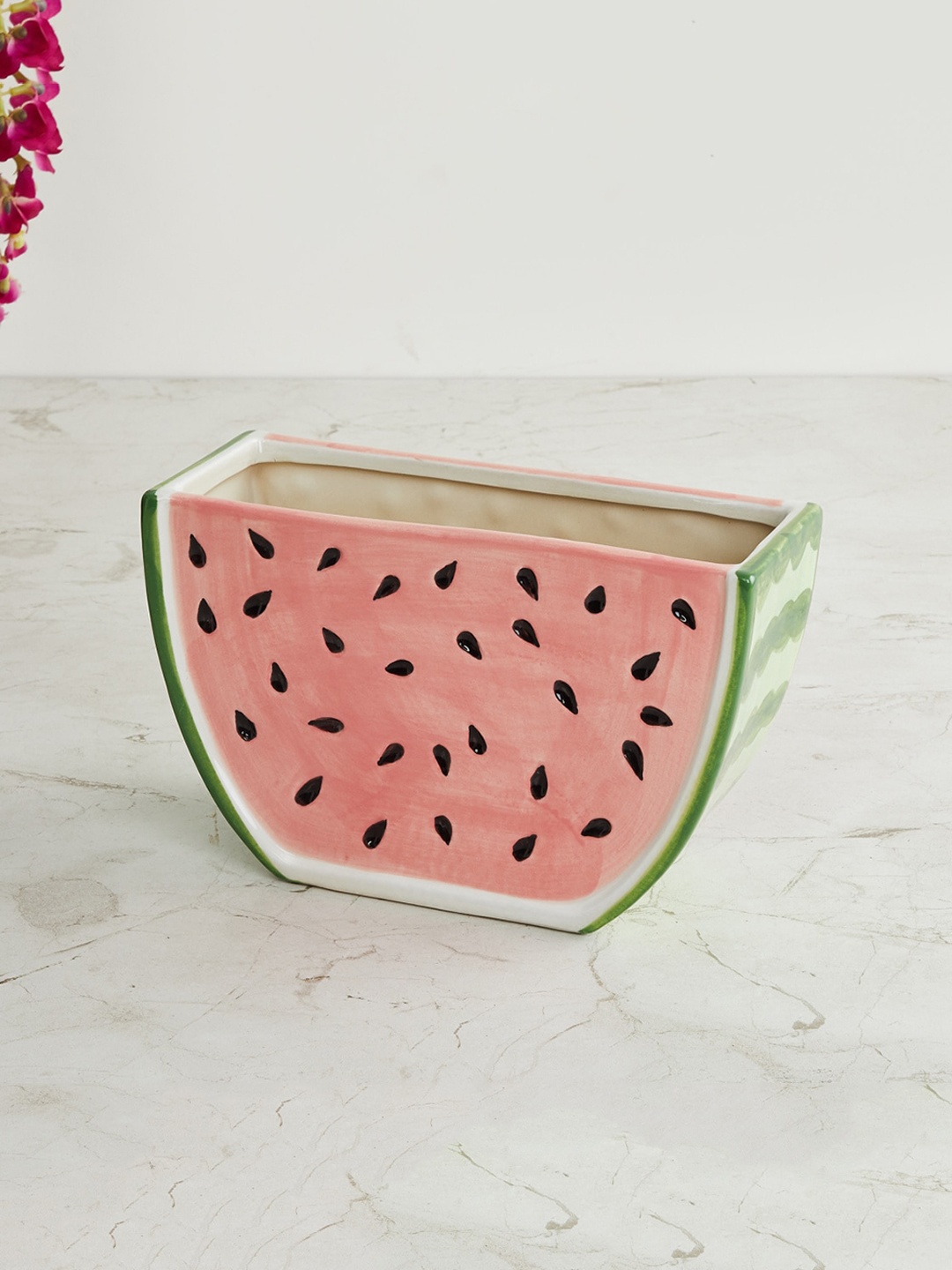 

Home Centre Pink Printed Watermelon Shaped Ceramic Planter