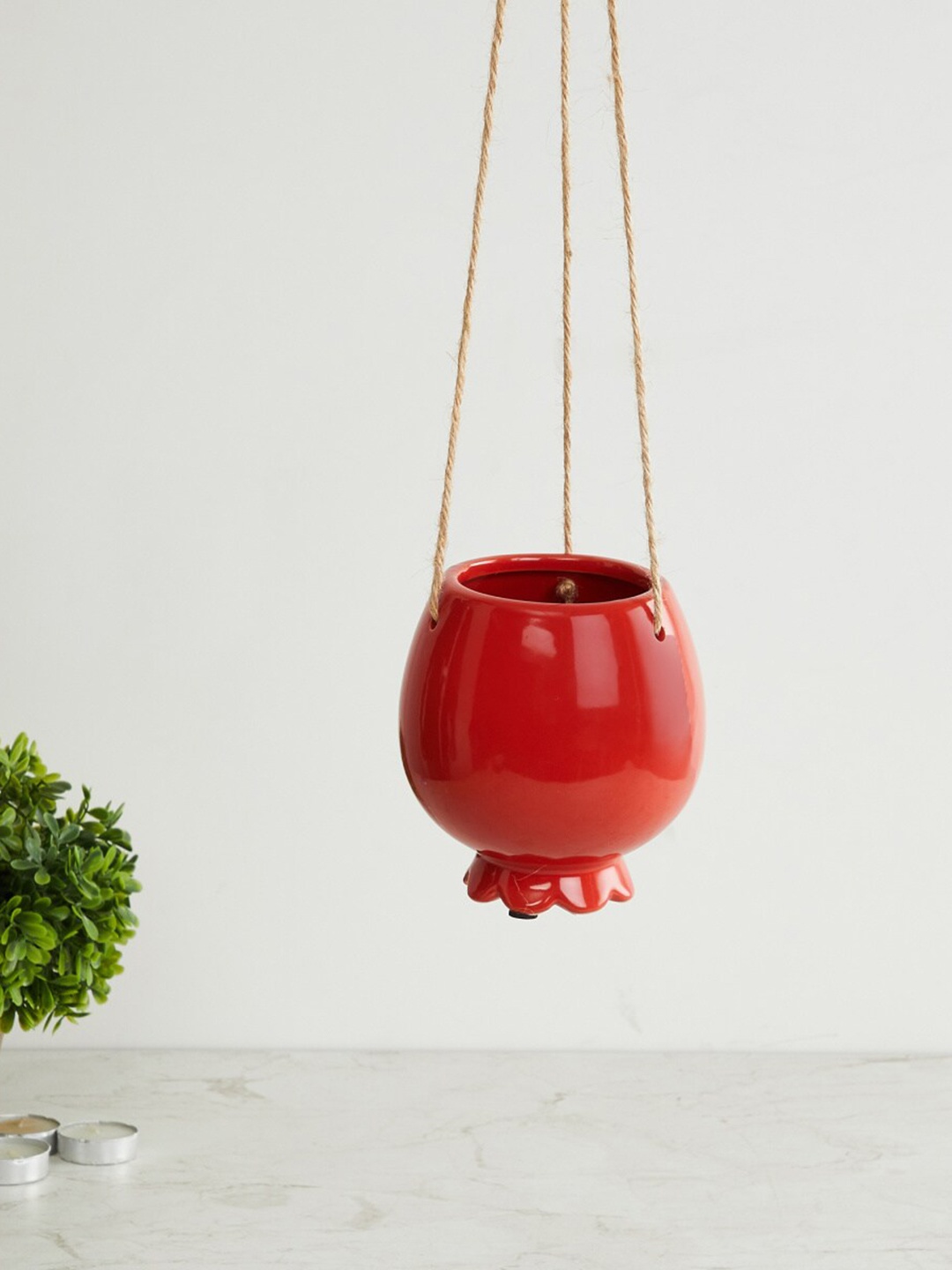 

Home Centre Red Solid Ceramic Hanging Planter