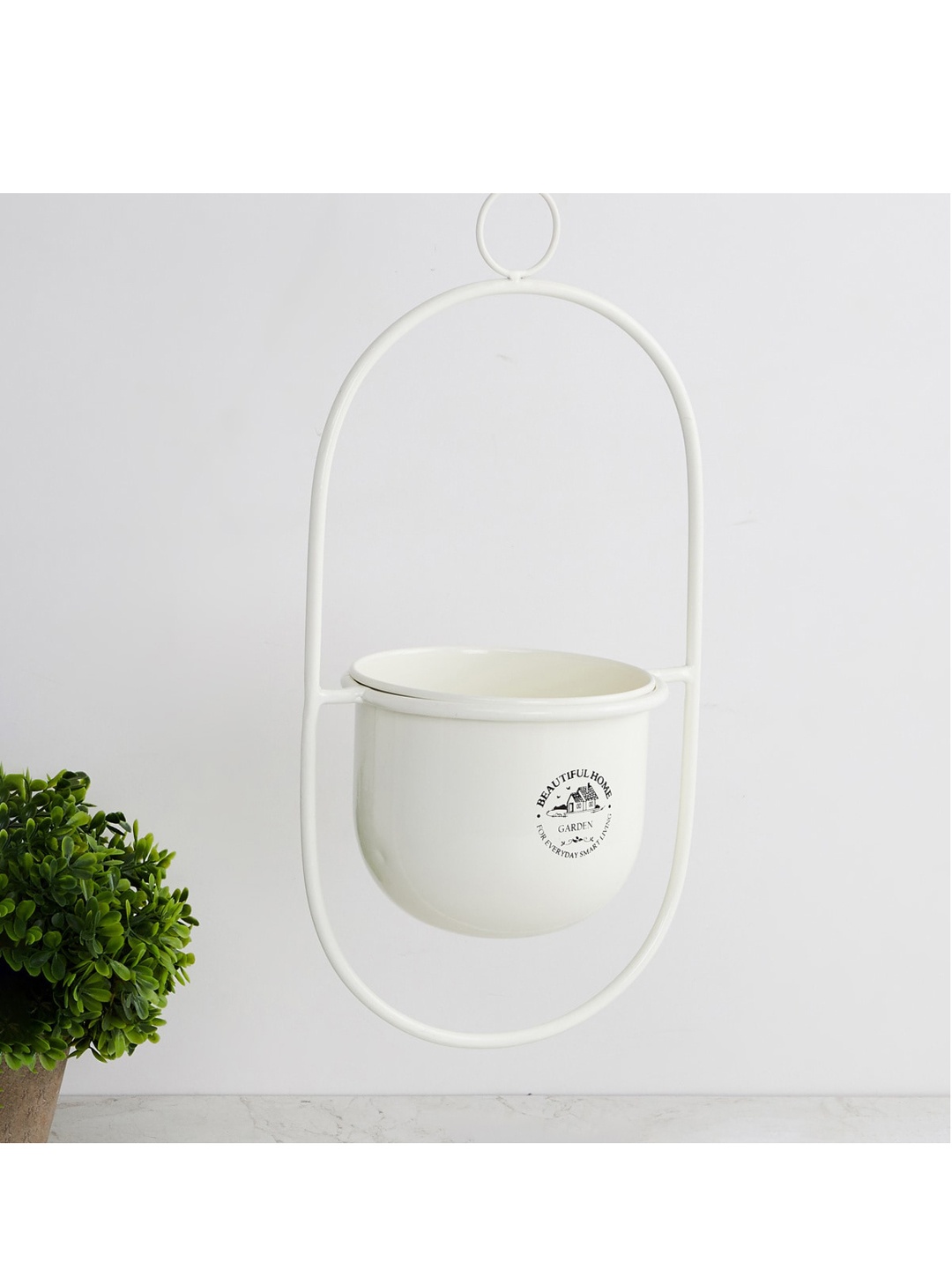 

Home Centre Off-White Printed Metal Round Hanging Planter