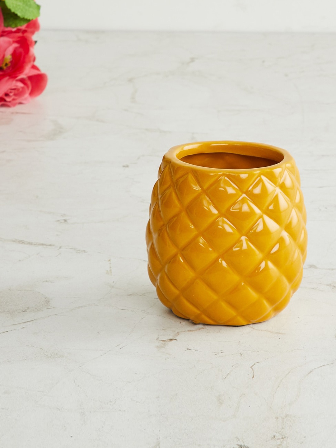 

Home Centre Yellow Textured Ceramic Planter