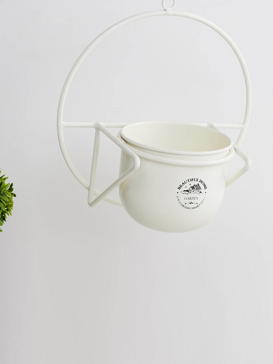 

Home Centre Off-White & Black Printed Metal Wall-Mounted Planter