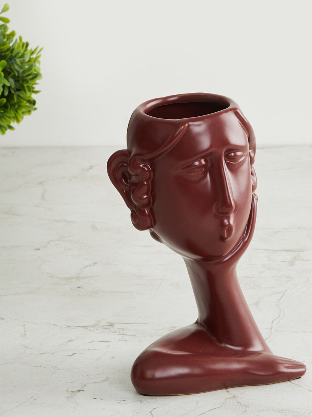 

Home Centre Brown Face Shaped Ceramic Planter