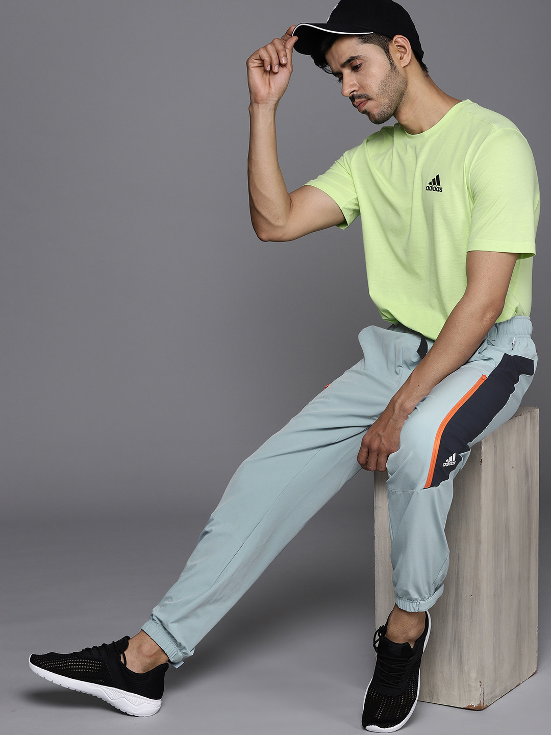 

ADIDAS Men Blue TRVL WVN PT Solid Sustainable Joggers