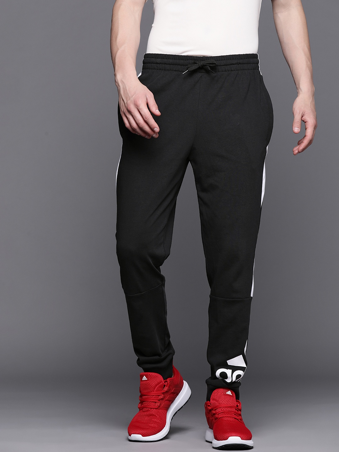 

ADIDAS Men Black Brand Logo Printed Sustainable Track Pants