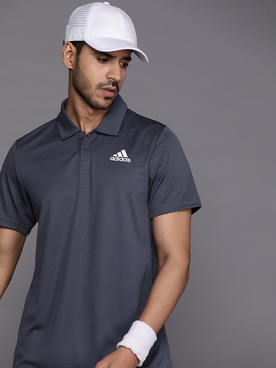 

ADIDAS Men Navy Blue Polo Collar T-shirt with Heat. Rdy Technology