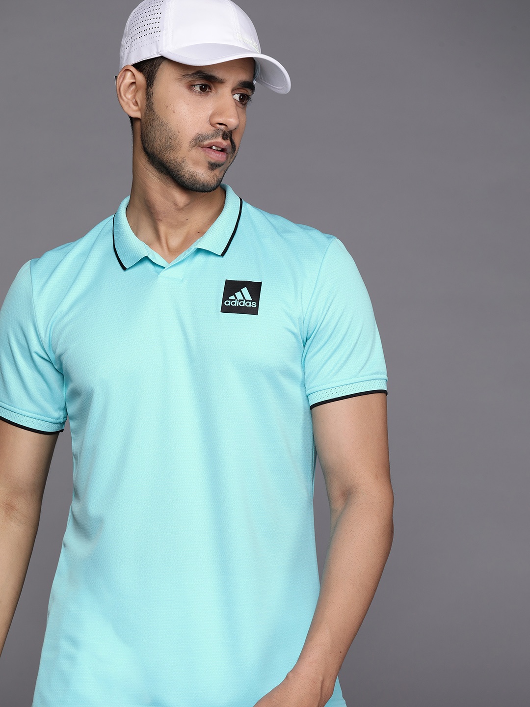 

ADIDAS Men Blue Polo Collar Tennis Freelift Slim Fit T-shirt with Heat. Rdy Technology