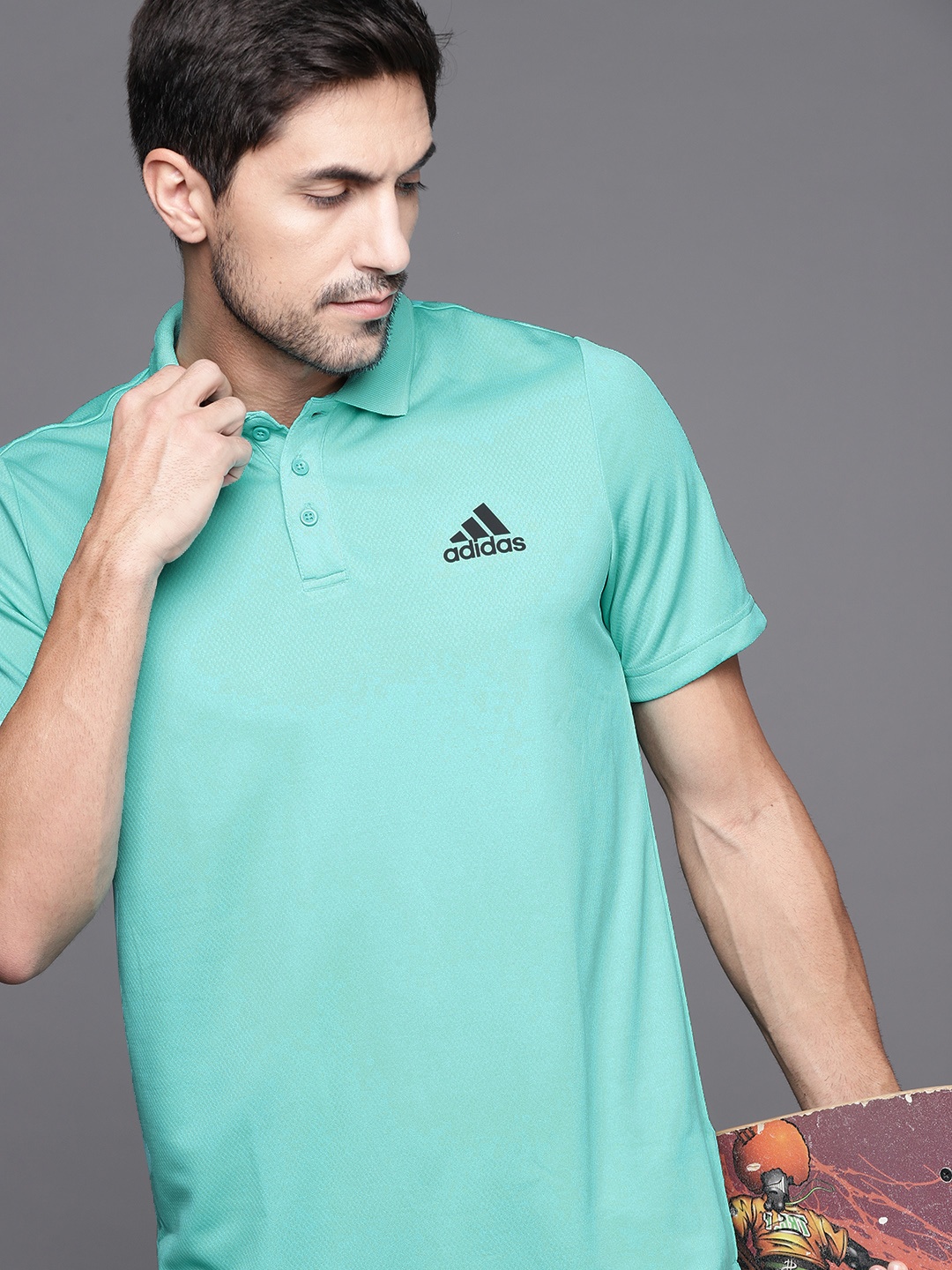 

ADIDAS Men Sea Green Solid D2M Polo T-shirt