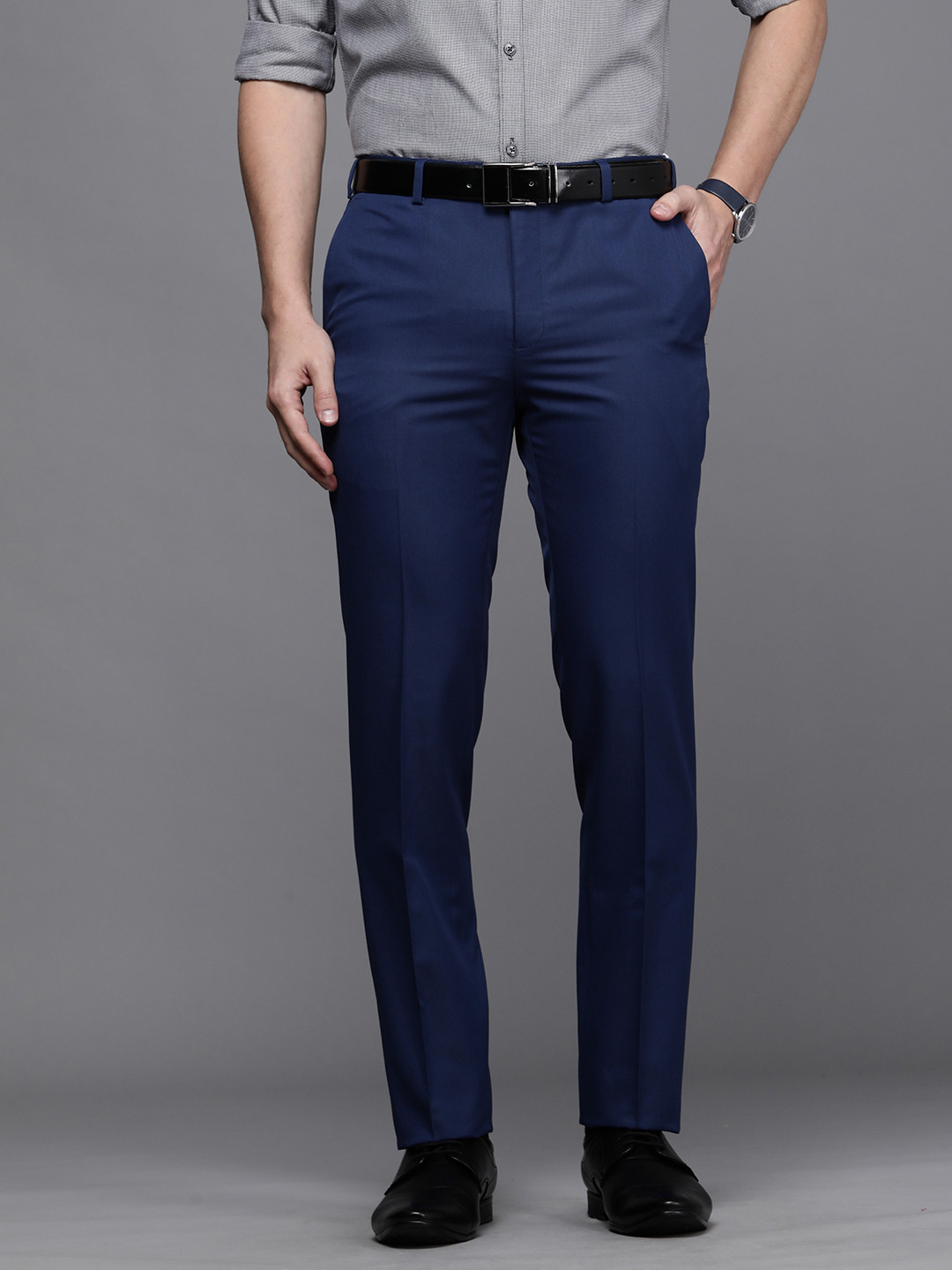 

Raymond Men Blue Solid Slim Fit Wrinkle Free Formal Trousers