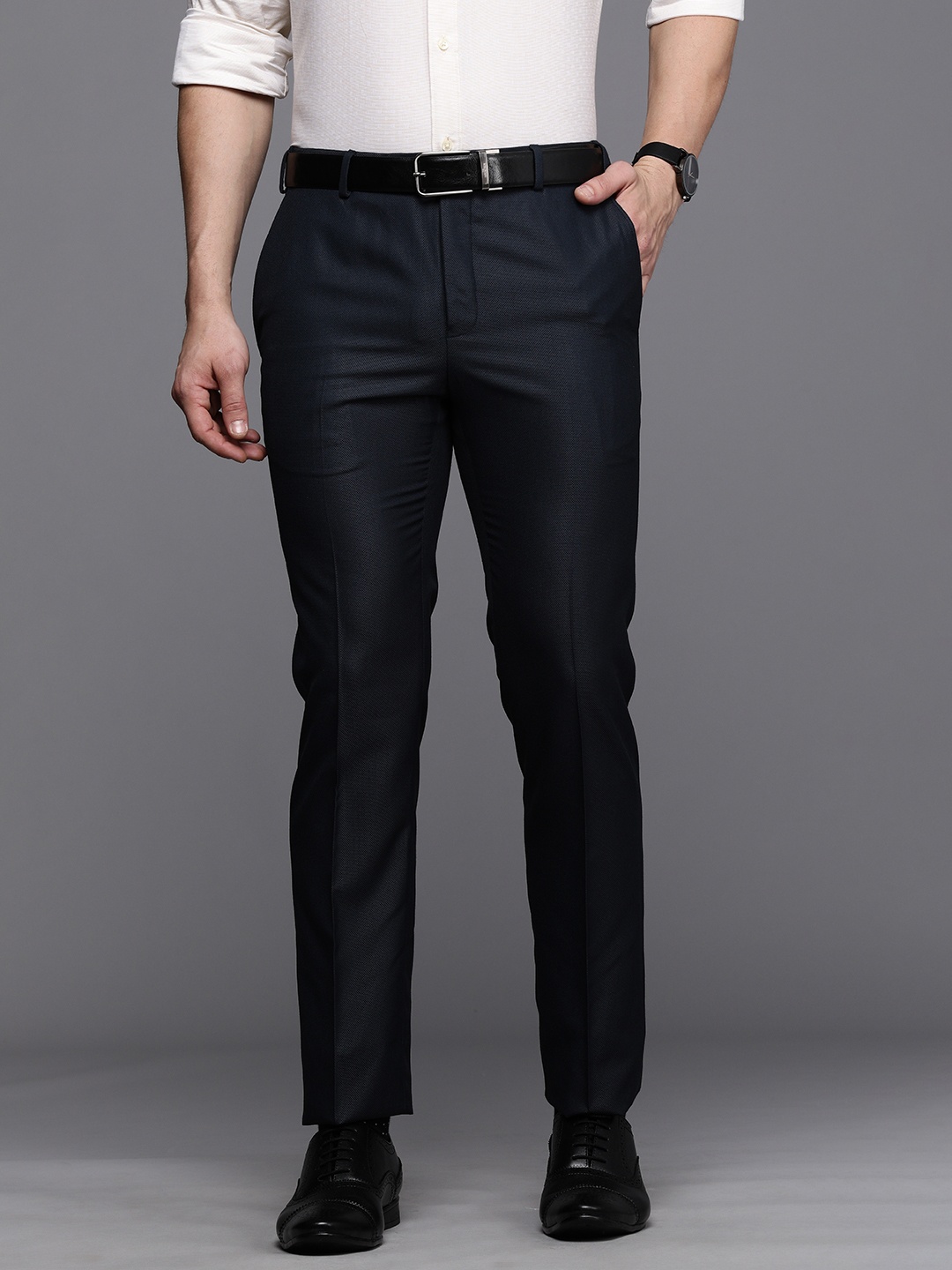 

Raymond Men Dark Blue Solid Slim Fit Wrinkle Free Formal Trousers