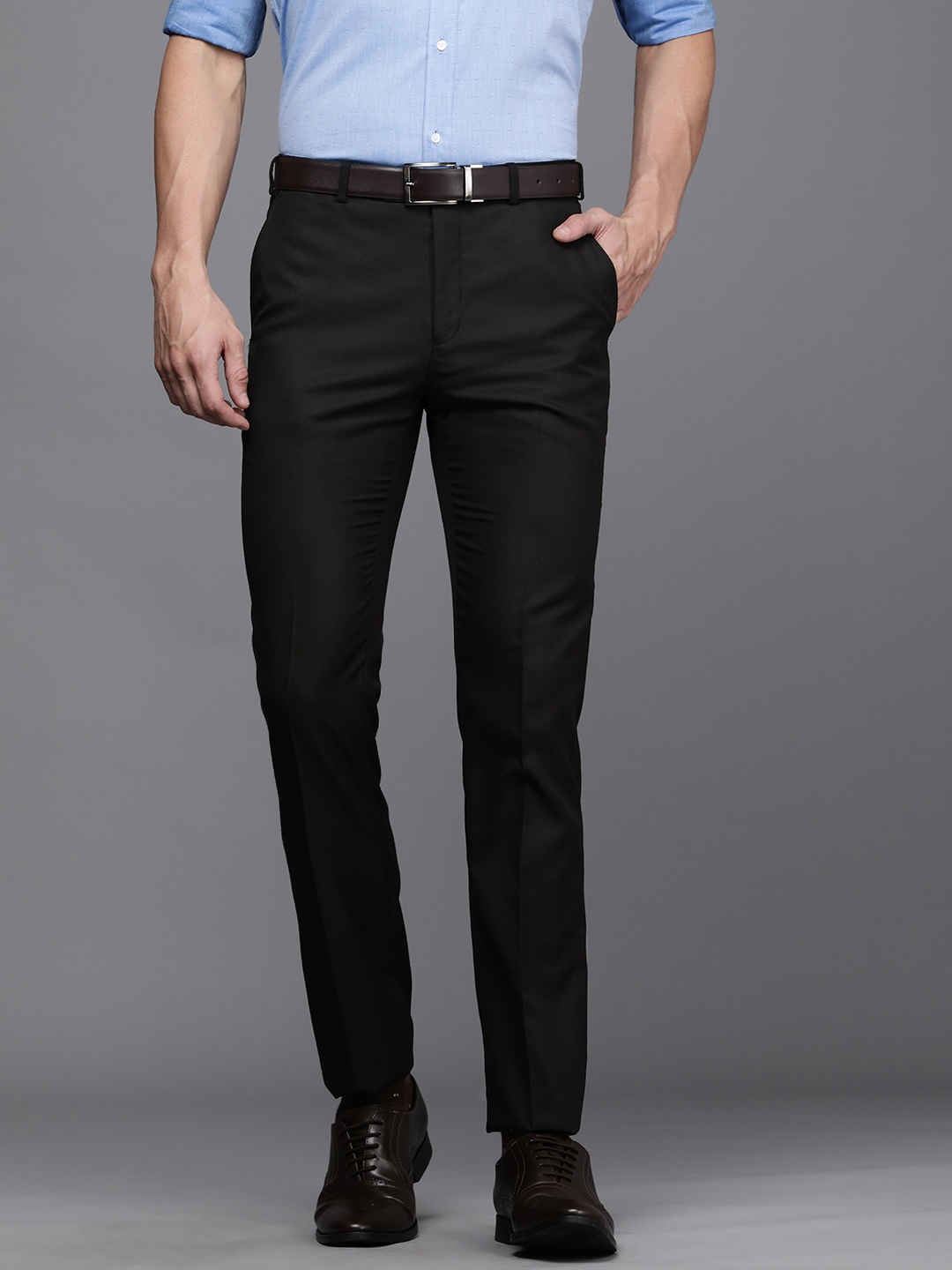

Raymond Men Black Solid Slim Fit Wrinkle Free Formal Trousers
