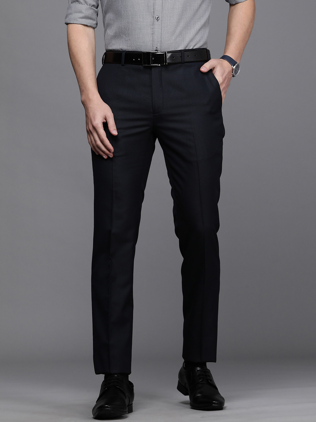 

Raymond Men Navy Blue Solid Slim Fit Wrinkle Free Regular Trousers
