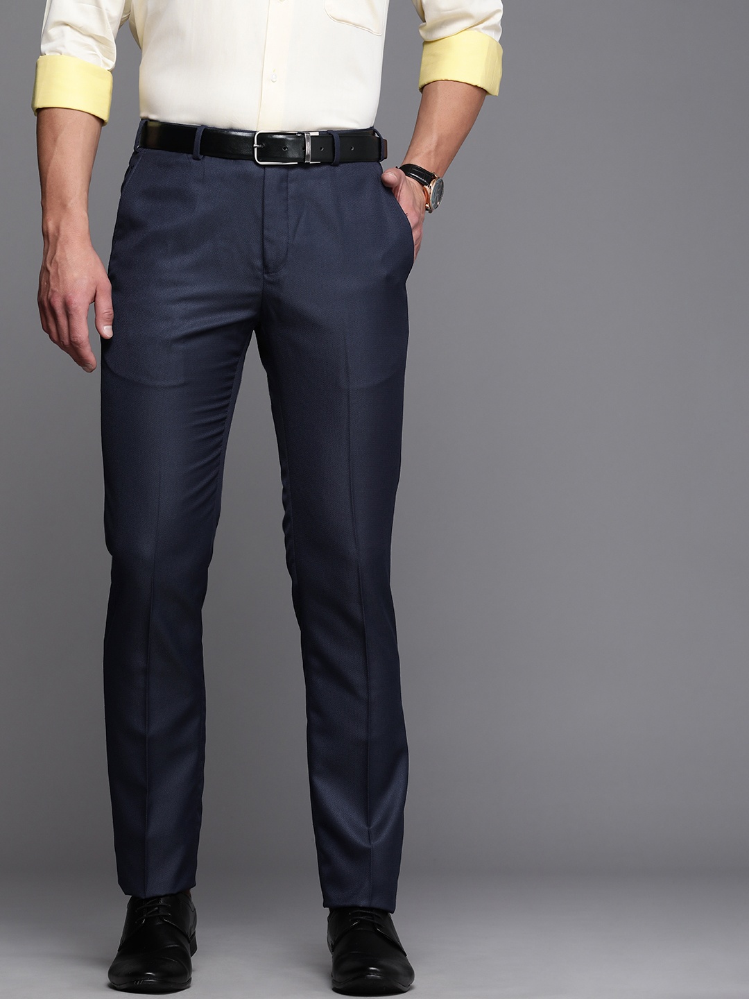 

Raymond Men Navy Blue Textured Self Design Slim Fit Mid-Rise Flat-Front Formal Trousers