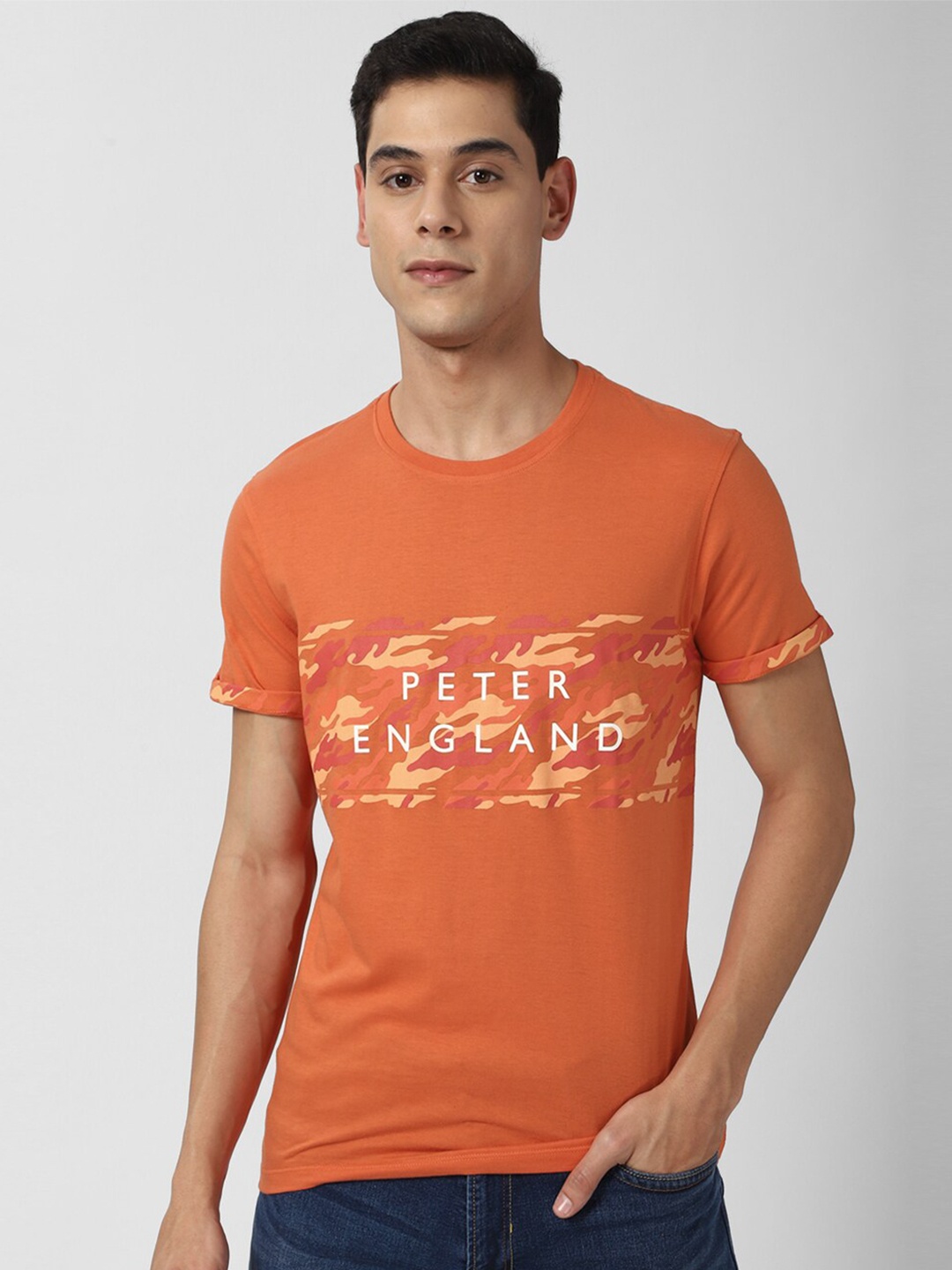

Peter England Casuals Men Orange Typography Printed Pockets Slim Fit T-shirt