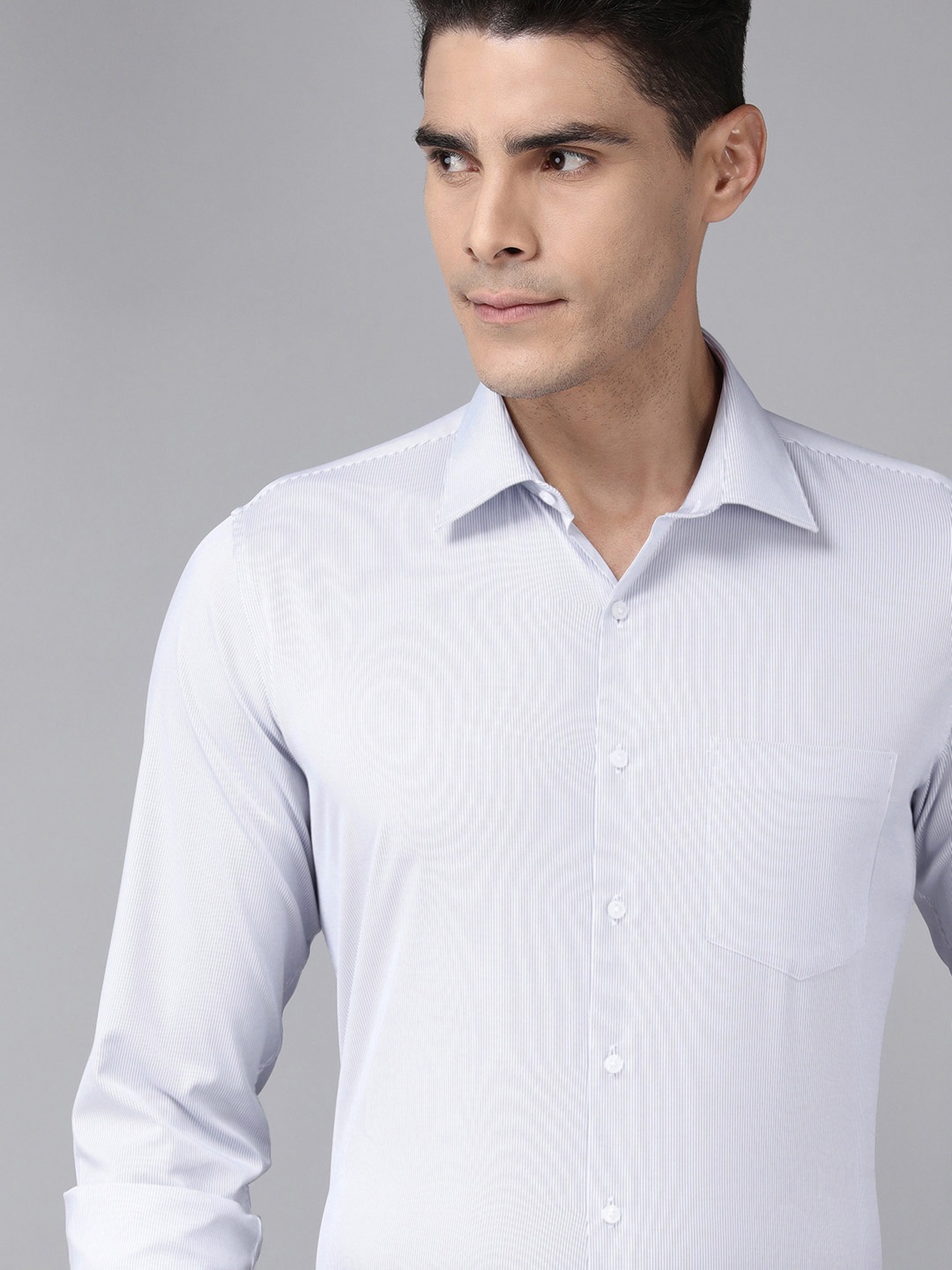 

Van Heusen Men Blue Slim Fit Striped Casual Shirt