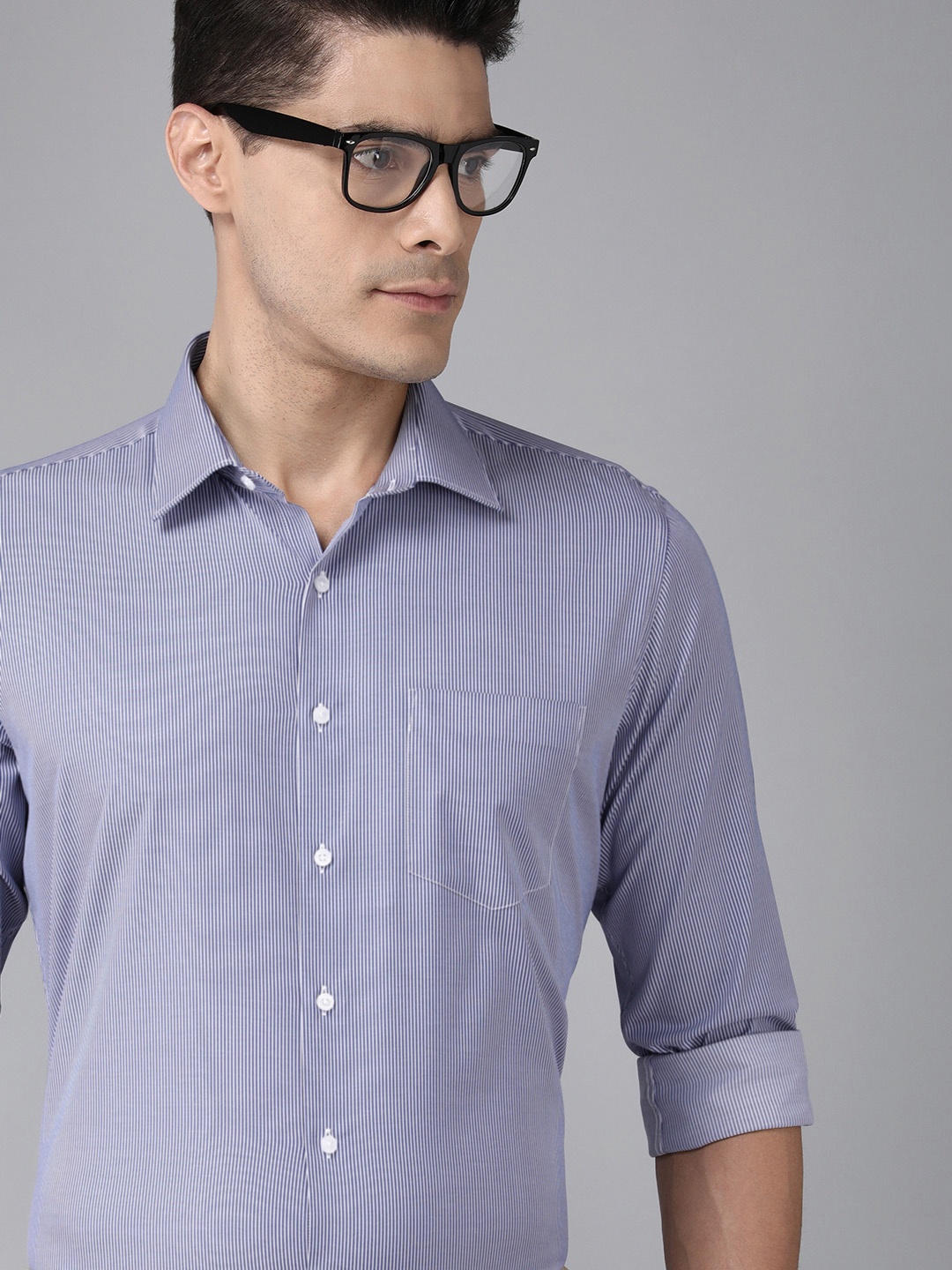 

Van Heusen Men Blue Slim Fit Striped Casual Shirt
